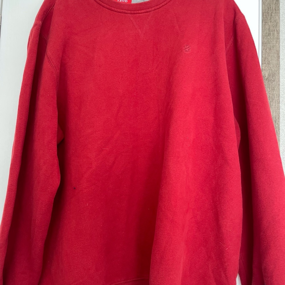 Red men’s Izod sweatshirt.